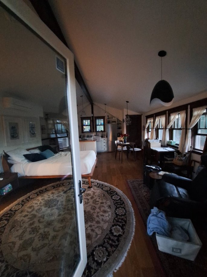 interior studio air b and b through glass door